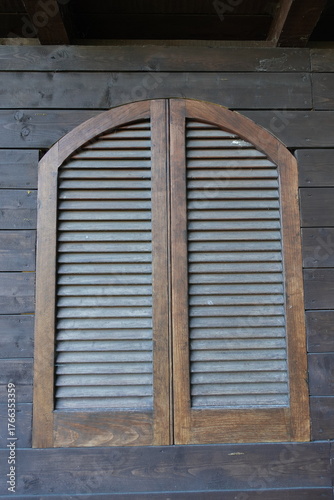 old wooden window with shutters
