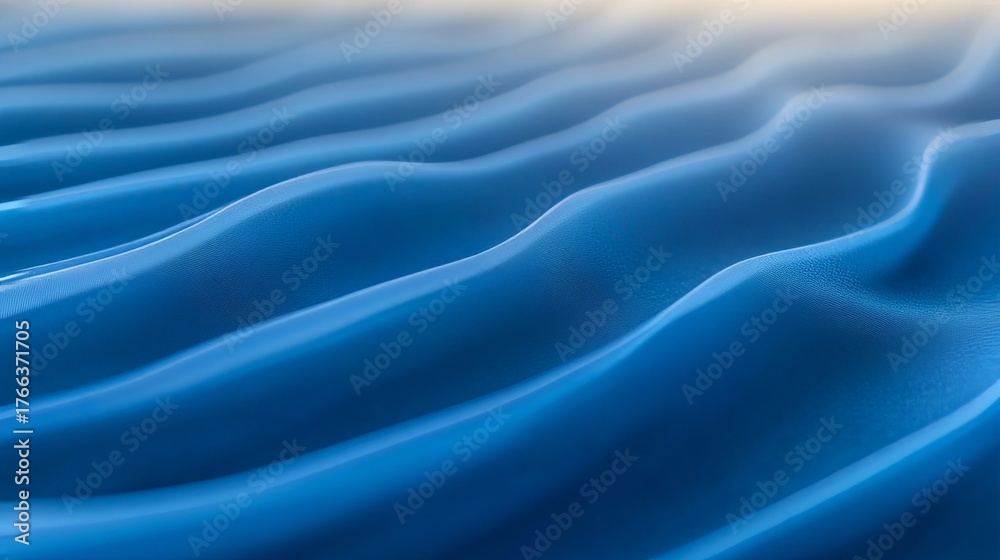 Obraz premium Captivating abstract blue waves creating a serene, flowing motion perfect for modern design backgrounds and calming visuals.
