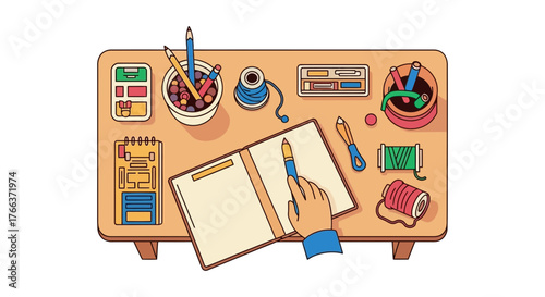 Creative hands crafting ideas on a desk with art supplies and notebook