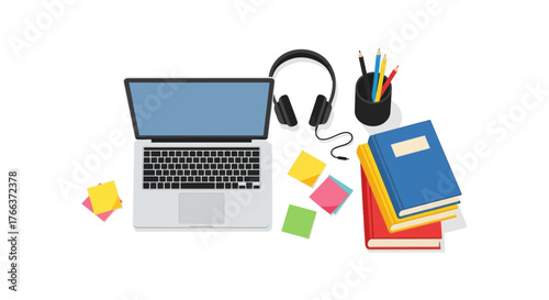Modern laptop with headphones and books suggests focused learning or remote work.