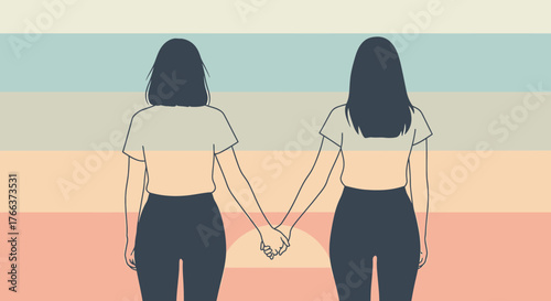 Two women holding hands, standing together, with a sunset background, showing support.