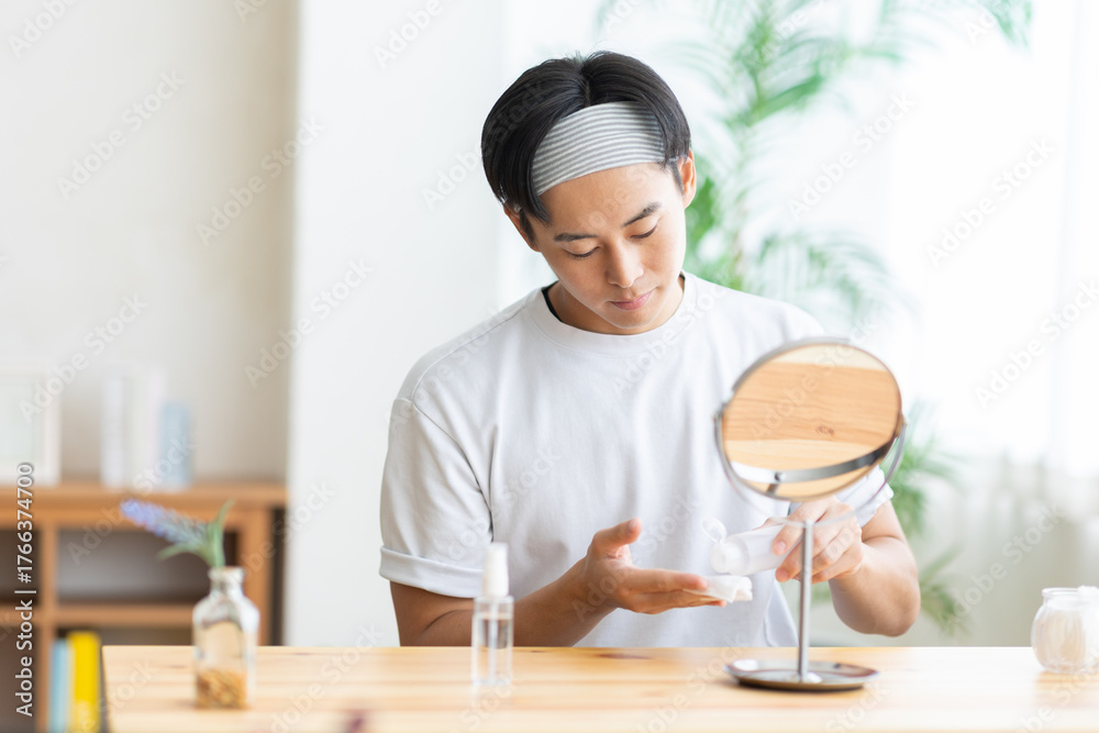 Fototapeta premium スキンケアをする男性