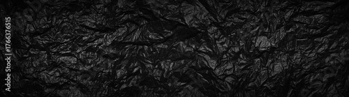 Black garbage bag texture background with copy space
