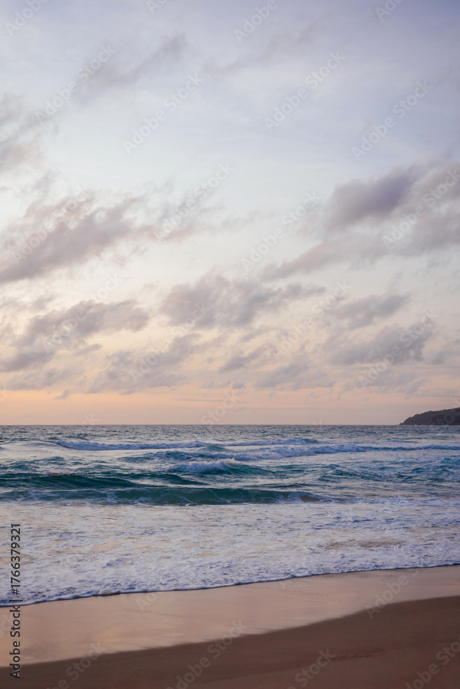 Fototapeta premium Soft Pastel Evening Over Waves at Karon Beach, Phuket, Thailand