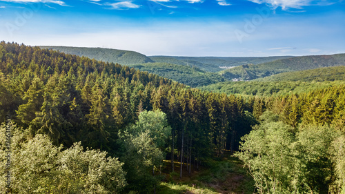 Aerial drone view of Ardennes mountains nature landscape from above, hills and forest on summer