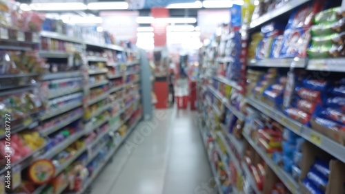 Wallpaper Mural Grocery aisle shelves stocked with snacks blur effect Torontodigital.ca