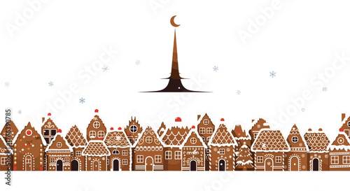 Gingerbread village with a tall tower and crescent moon decoration.