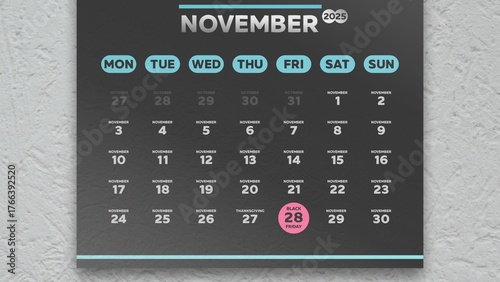 The date of Black Friday 2025 highlighted on a black wall calendar November page
