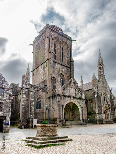 View of the Sant Ronan church in the antique village of Locronan in Brittany, France