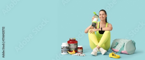 Sporty young woman with jar...