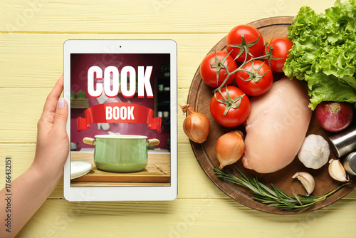 Woman with digital recipe b...