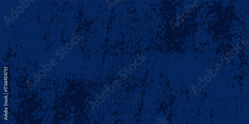 Modern beautifully textured royal blue painted surface with subtle lighting and brush strokes abstract