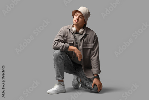 Stylish young man in bucket...