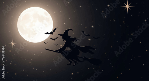 Silhouette of a witch flying on a broomstick against a full moon.