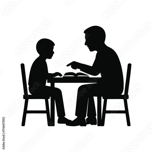 Silhouette of a father and son sitting at a table.