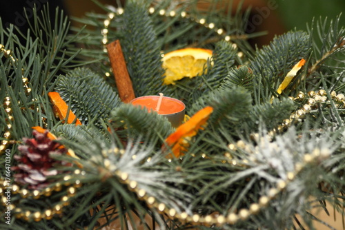Christmas Advent Wreath Detail with Candle, Cinnamon, and Gold Beads