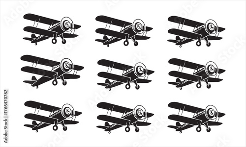 Collection of old-fashioned airplanes in black silhouette, traditional biplane models for flight or travel concept art
