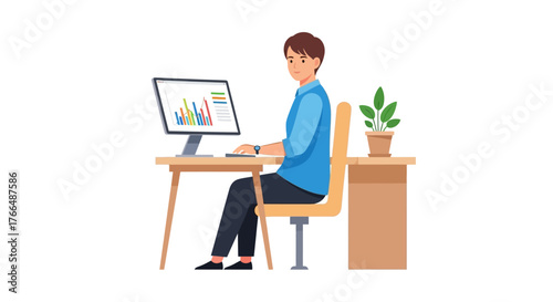 A man works at a desk with a computer and plant wearing a blue shirt and looking forward