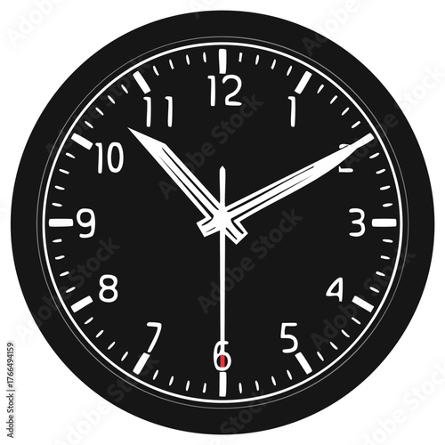 Close-up of a black analog clock face with white numbers and hands indicating time