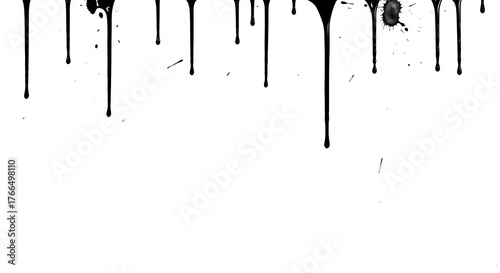 Black paint drips and splatters on a white background creating an abstract border design element