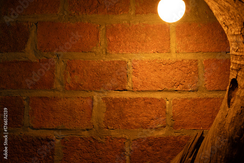Brick wall in the dark with lights