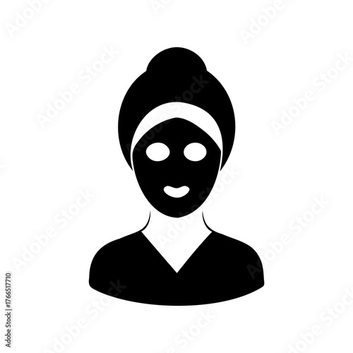 Silhouette of a woman with a facial mask and a hair wrap