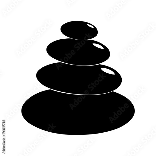 Stack of four smooth black pebbles balanced on top of each other