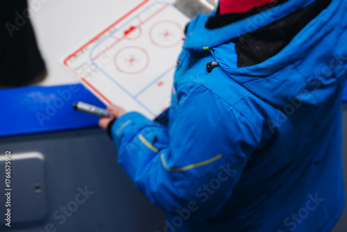 Photography Hockey match game on ice rink arena stadium, team of ice hockey professional pla