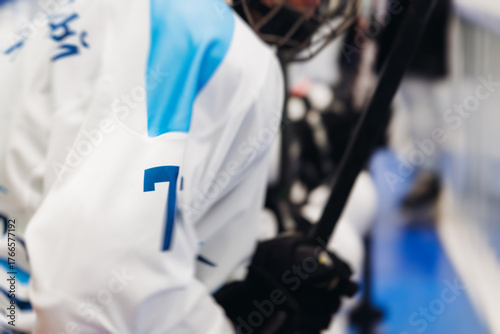 Photography Hockey match game on ice rink arena stadium, team of ice hockey professional pla
