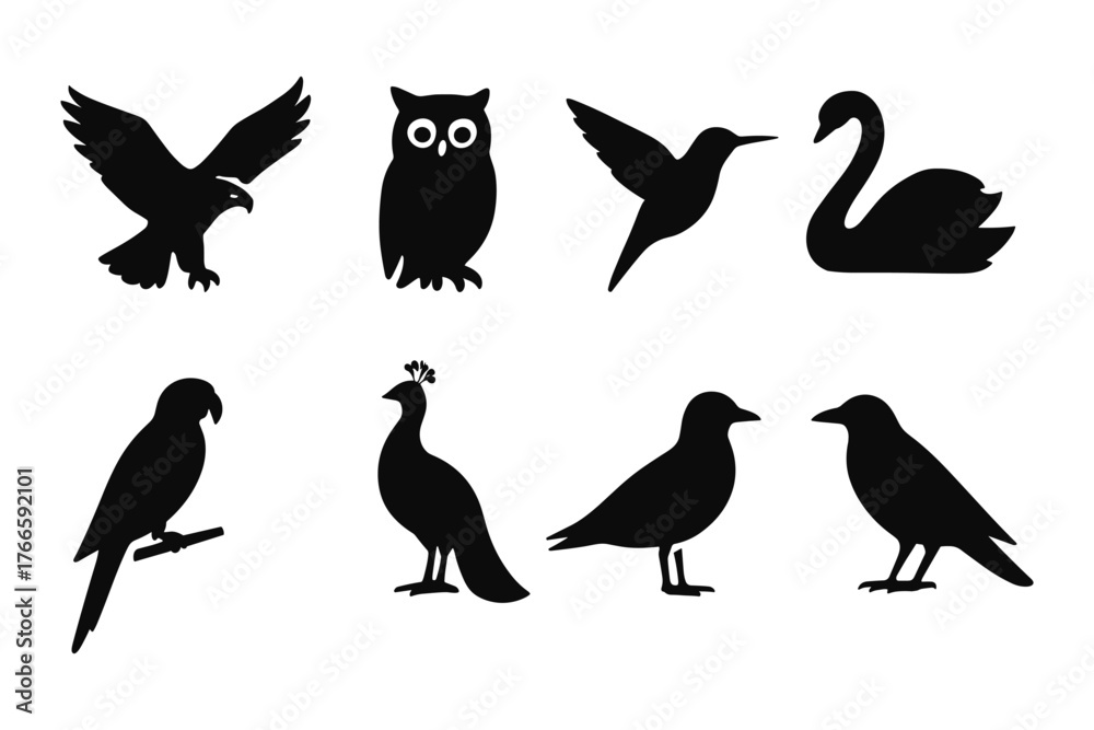 Fototapeta premium Bird silhouette collection featuring owl, swan, and peacock designs