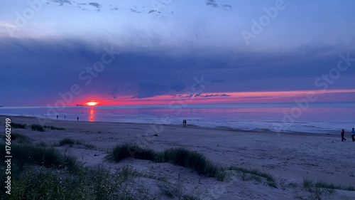 Beautiful sunset over calm sea horizon