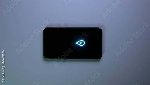 Flat lay of modern smartphone with glowing alert symbol, gray surface