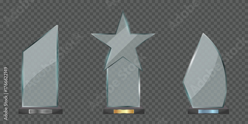 Three glass awards with different shapes on a transparent checkered background are displayed here