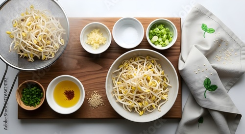 Sukju Namul Ingredient Preparation with Blanched Mung Bean Sprouts, Sesame, Garlic, and Seasoning Bowls (Korean Cuisine)