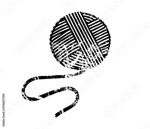 Yarn ball unravels in crafting scene