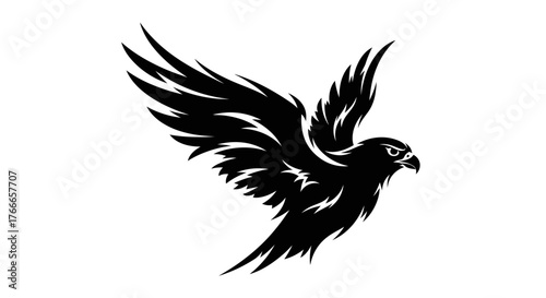 A striking black silhouette of a falcon in mid-flight, wings spread wide, showcasing its sharp features and powerful form.