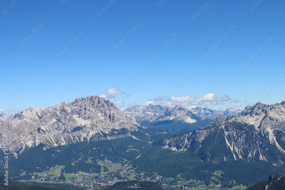 Fototapeta premium Refugio Nuvolau viewpoint with dramatic Dolomites skyline and alpine ridges in Italy