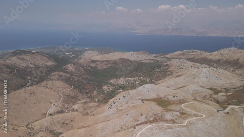 Aerial view of Greek coast with view and hill by the sea. Hills around
