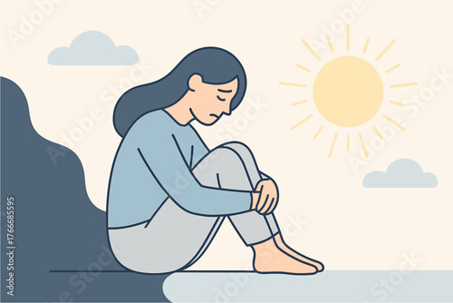 Sad woman sitting alone — depression and mental health concept