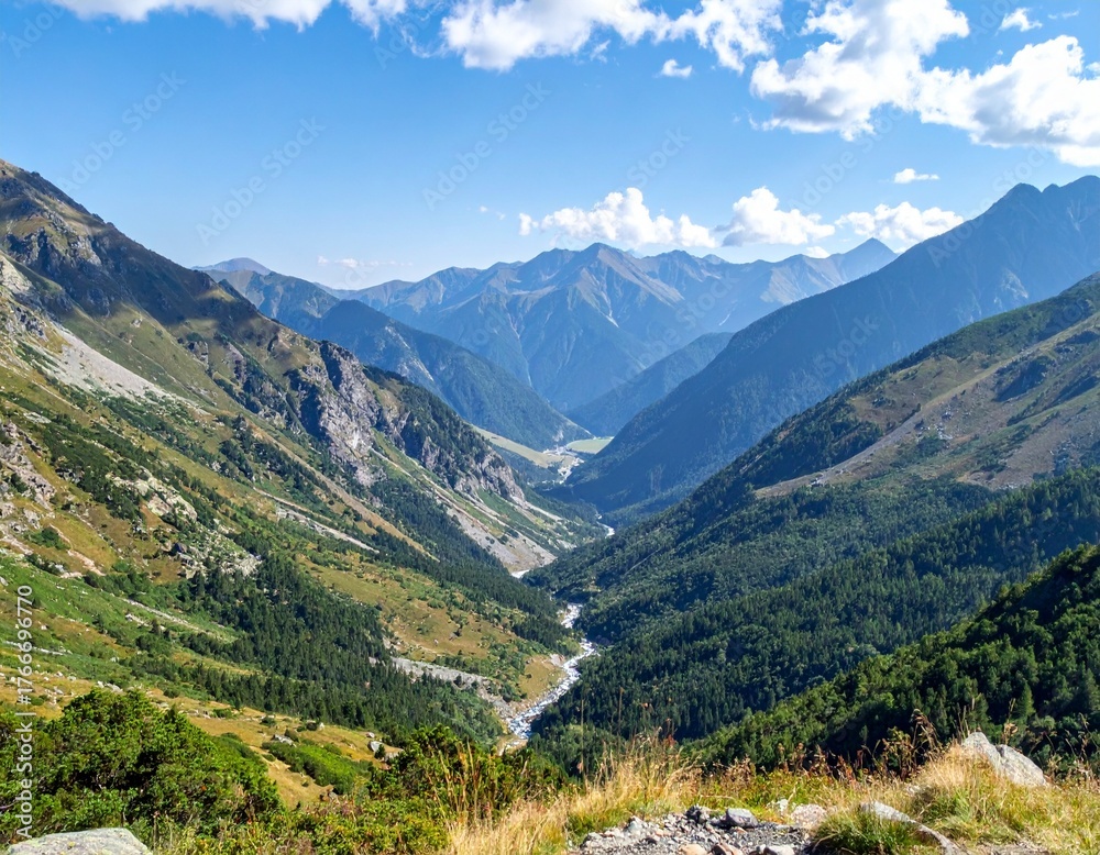 Fototapeta premium Beautiful valley between mountain ranges showing natural landscape and scenic view