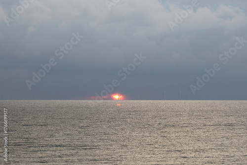 Sunset at the wind farm, evening, offshore wind farm, wind turbines
