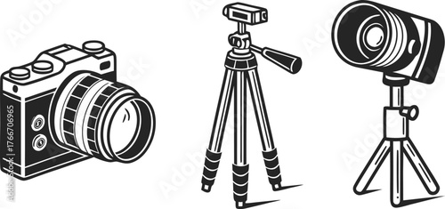 Old black and white vintage movie camera on tripod with film projector and photography equipment