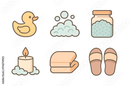 Bath and spa essentials set with rubber duck, bath salts, foam, candle, towels, and slippers