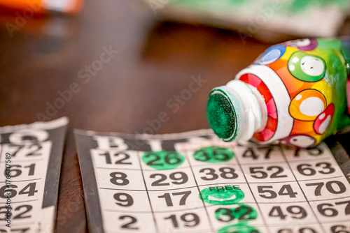 Bingo cards and markers display fun and excitement during a lively game night with friends