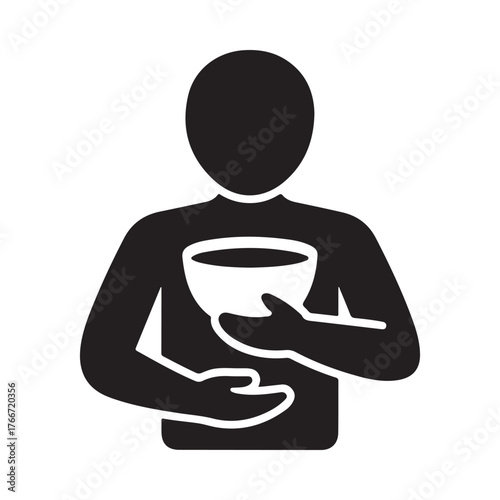 Silhouette of a person holding a bowl of food or drink
