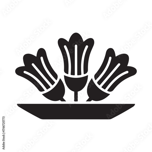 Stylized black silhouette of three blooming flowers on a plate