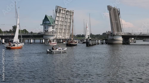 Schlei Bridge in Kappeln closing as sailboats pass through a channel
