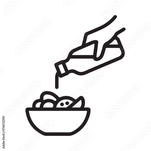 Hand pouring liquid from a bottle into a bowl of food