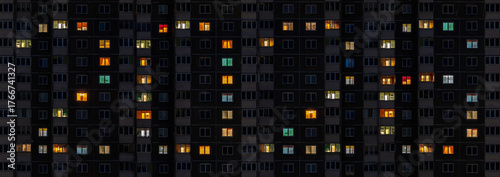 sign 2026 in flat night panorama of multicolor light in windows of multistory buildings as concept for new year