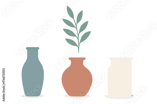 Minimalist ceramic vases holding single green plant branch arrangement
